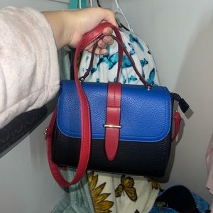 Red black and blue crossbody handbag